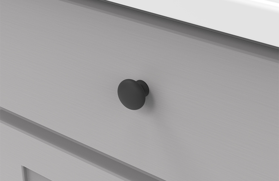 P770-MB_920x600 Close-up of gray wood cabinet with white countertop and Hickory Hardware matte black knob