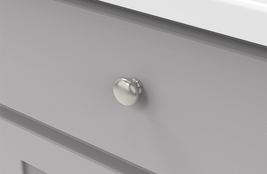 P770-SS_920x600 Close-up of gray wood cabinet with white countertop and Hickory Hardware stainless steel knob